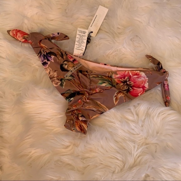 Vitamin A Gidget Brazilian cut floral bikini bottoms with adjustable side tie. - Picture 3 of 8